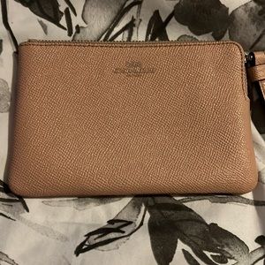 Pink coach wristlet